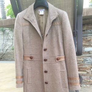 100% Lambswool and leather trim coat.